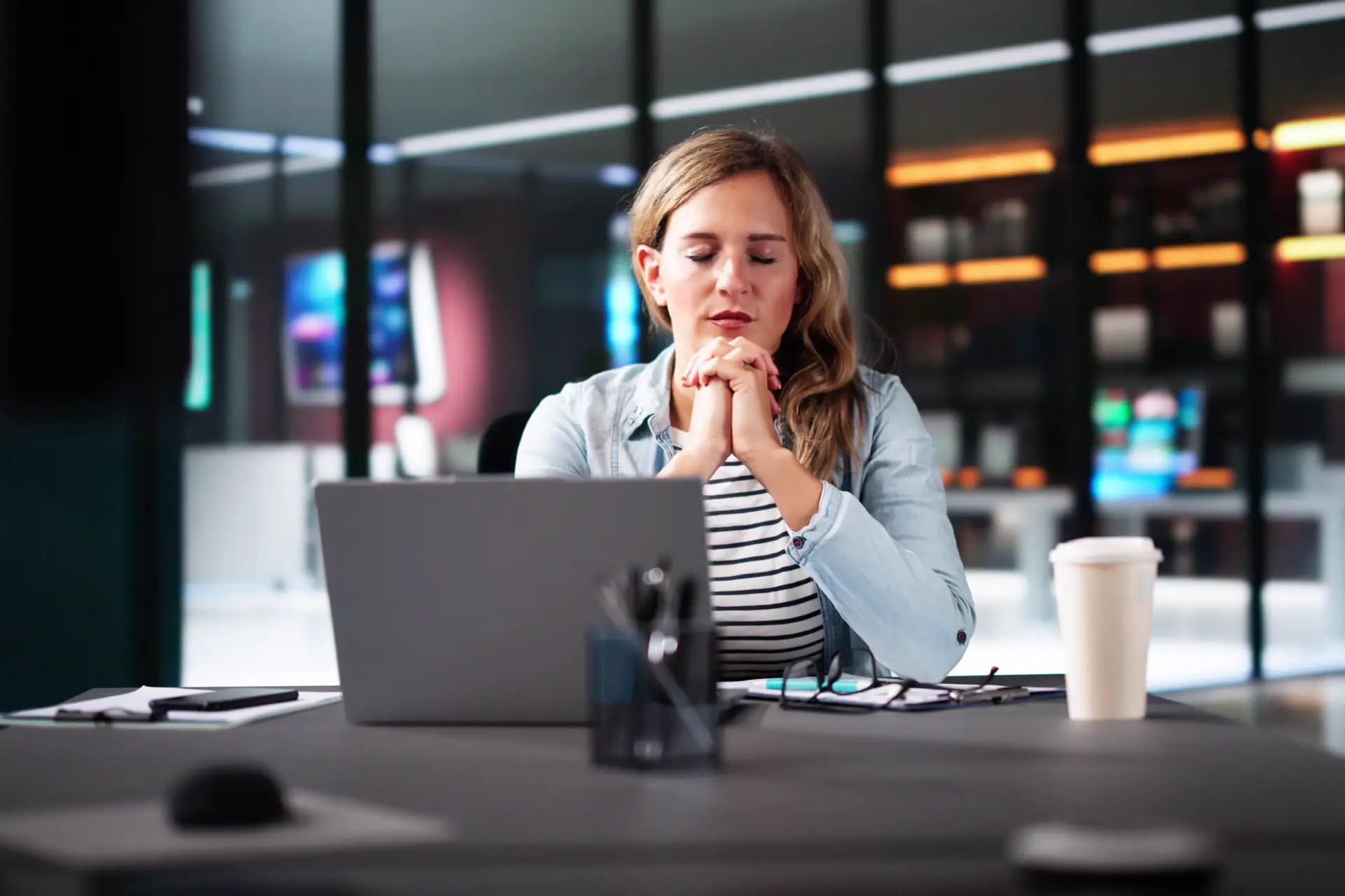 Spiritual Woman Seeking Guidance From God Through Prayer In Her Office