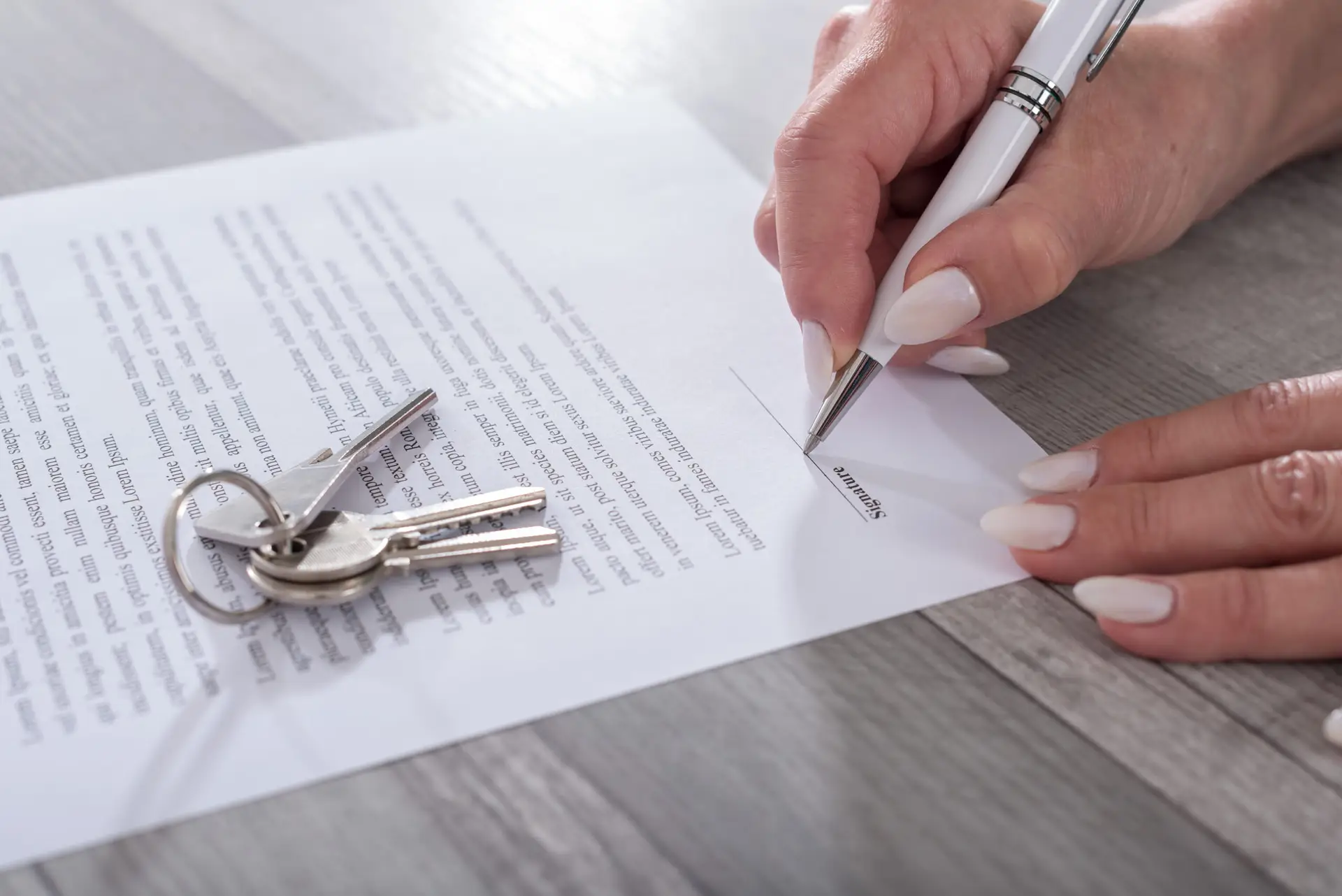 Customer signing a real estate contract