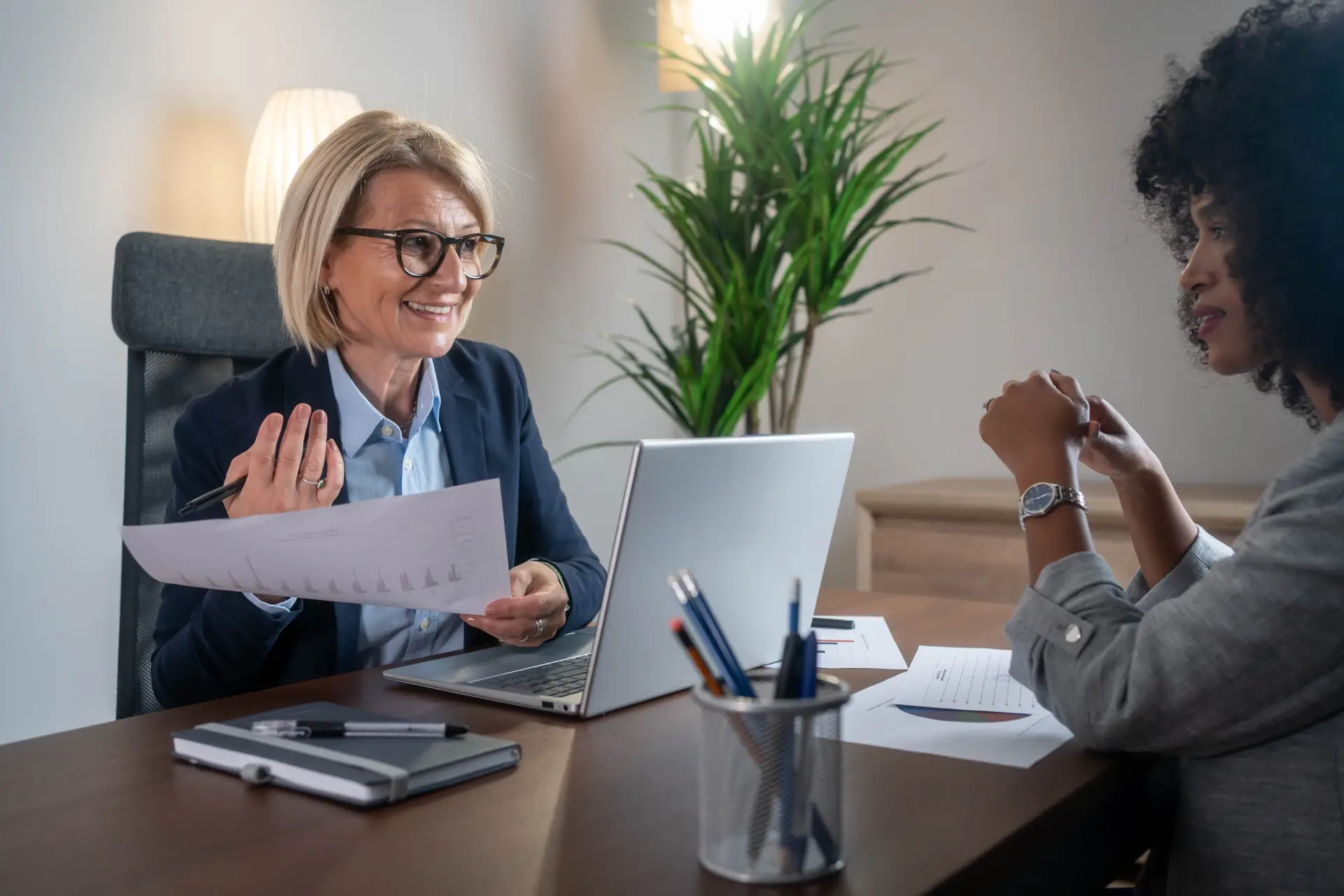 Woman consulting with a female financial manager at the bank
