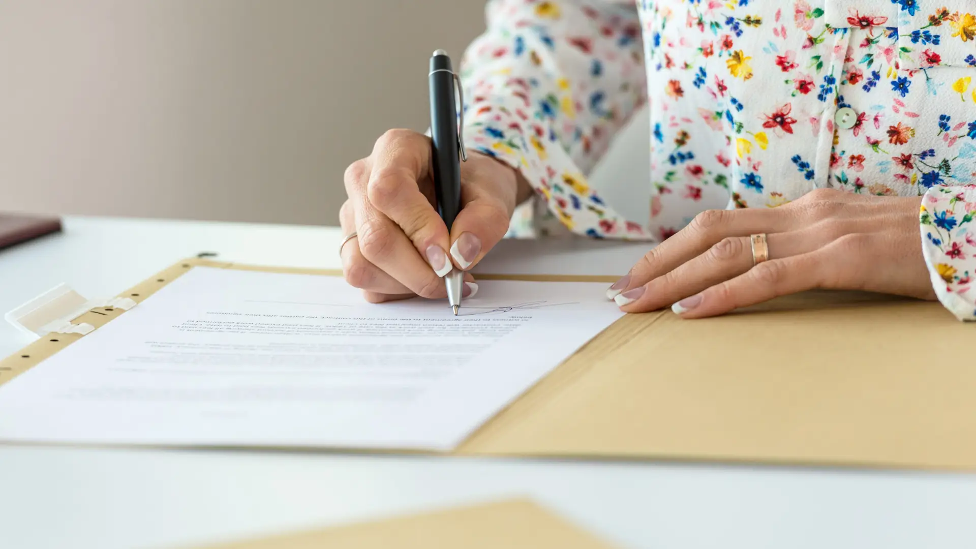 Businesswoman signing contract