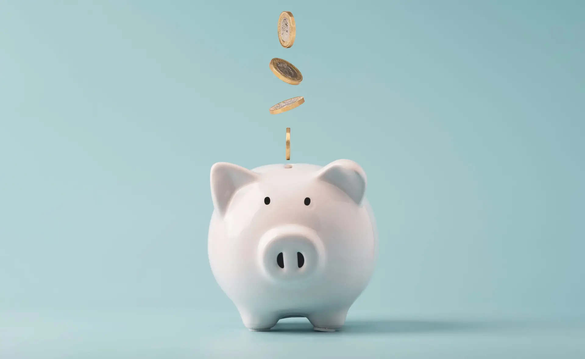 Coins falling to white piggy saving ,  Financial and money depos