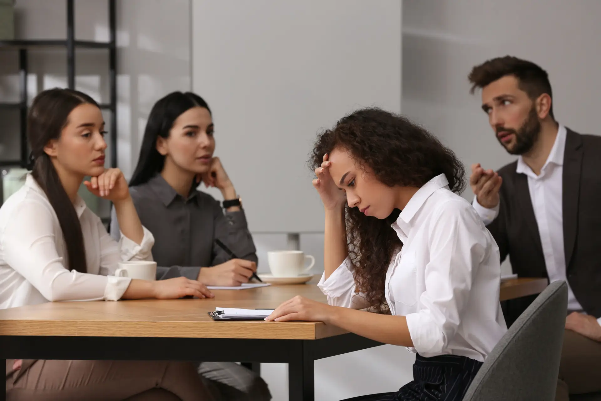 African American woman suffering from racial discrimination at work