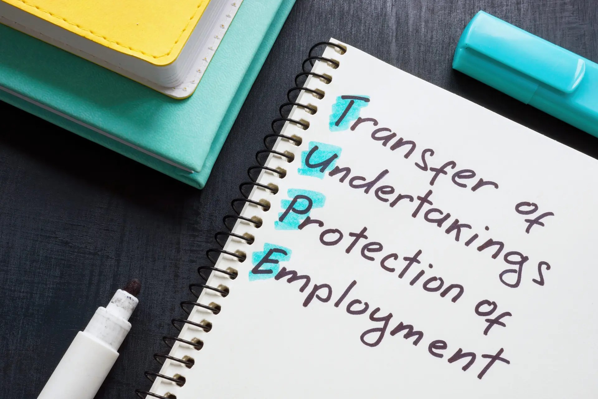 Page with words TUPE Transfer of Undertakings Protection of Employment Regulations.