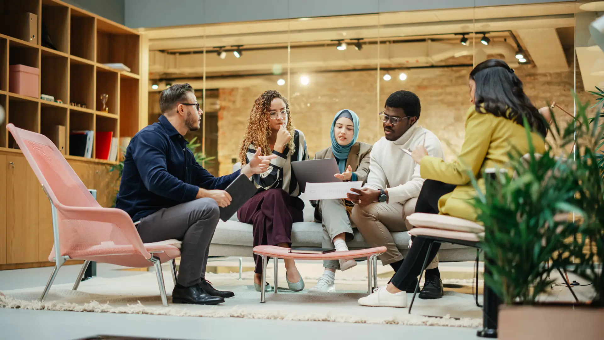 Multiethnic Group of Creative People Working on Project in a Mod