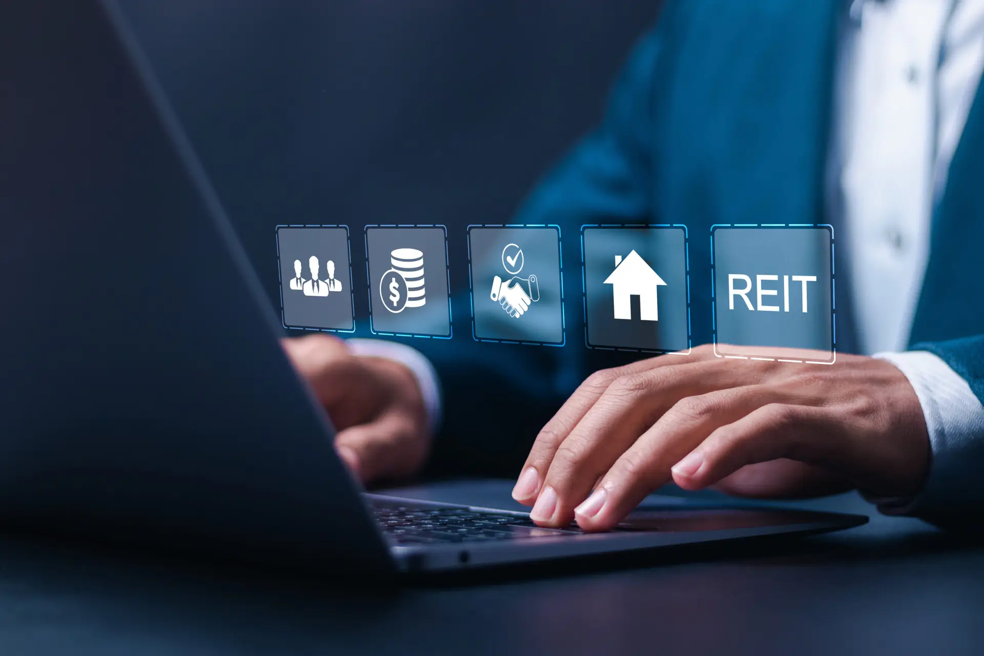 REIT, Real estate investment trust concept. Businessman use laptop with virtual reit icons for real estate management that generates continuous income.