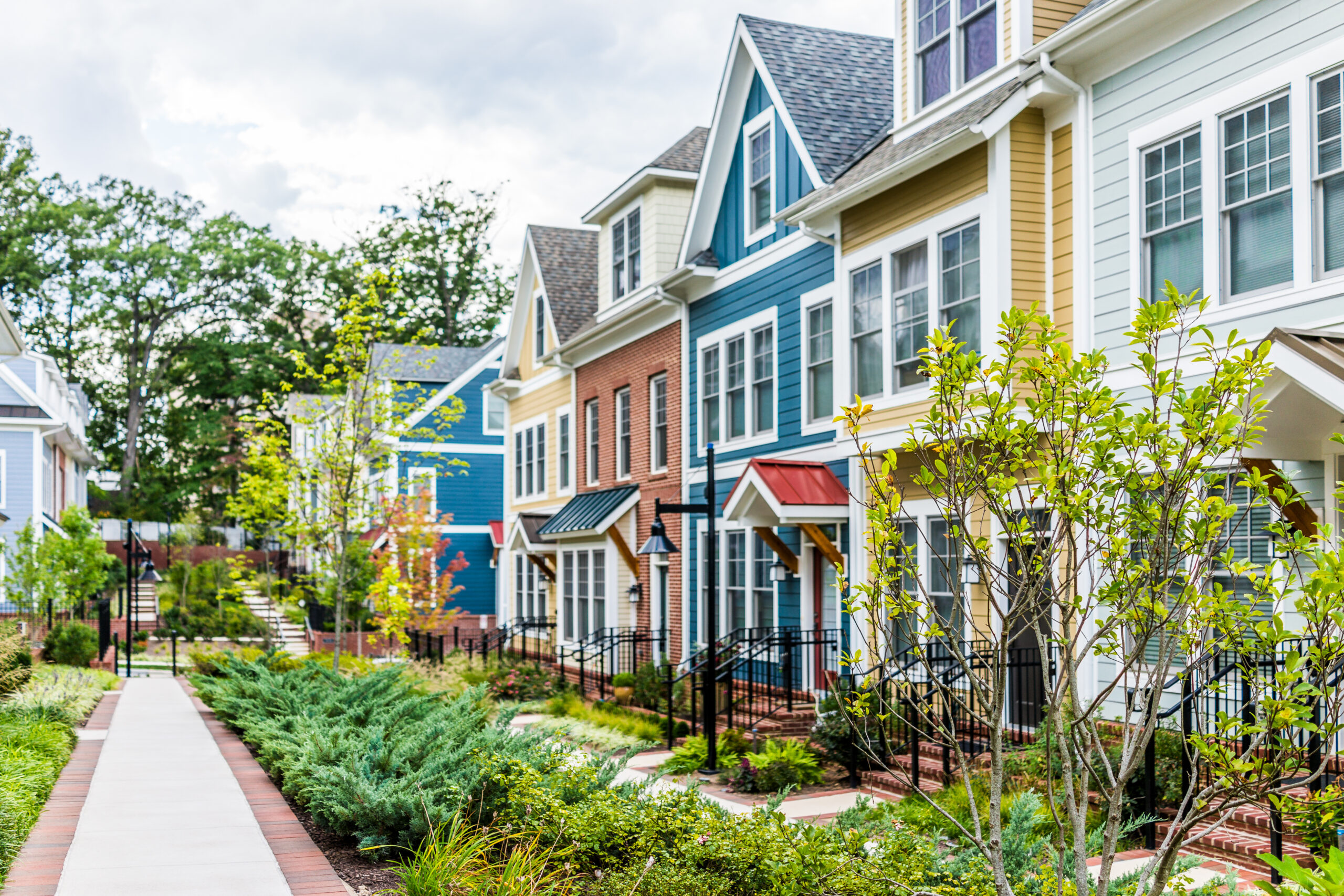 Row of colorful, red, yellow, blue, white, green painted residen