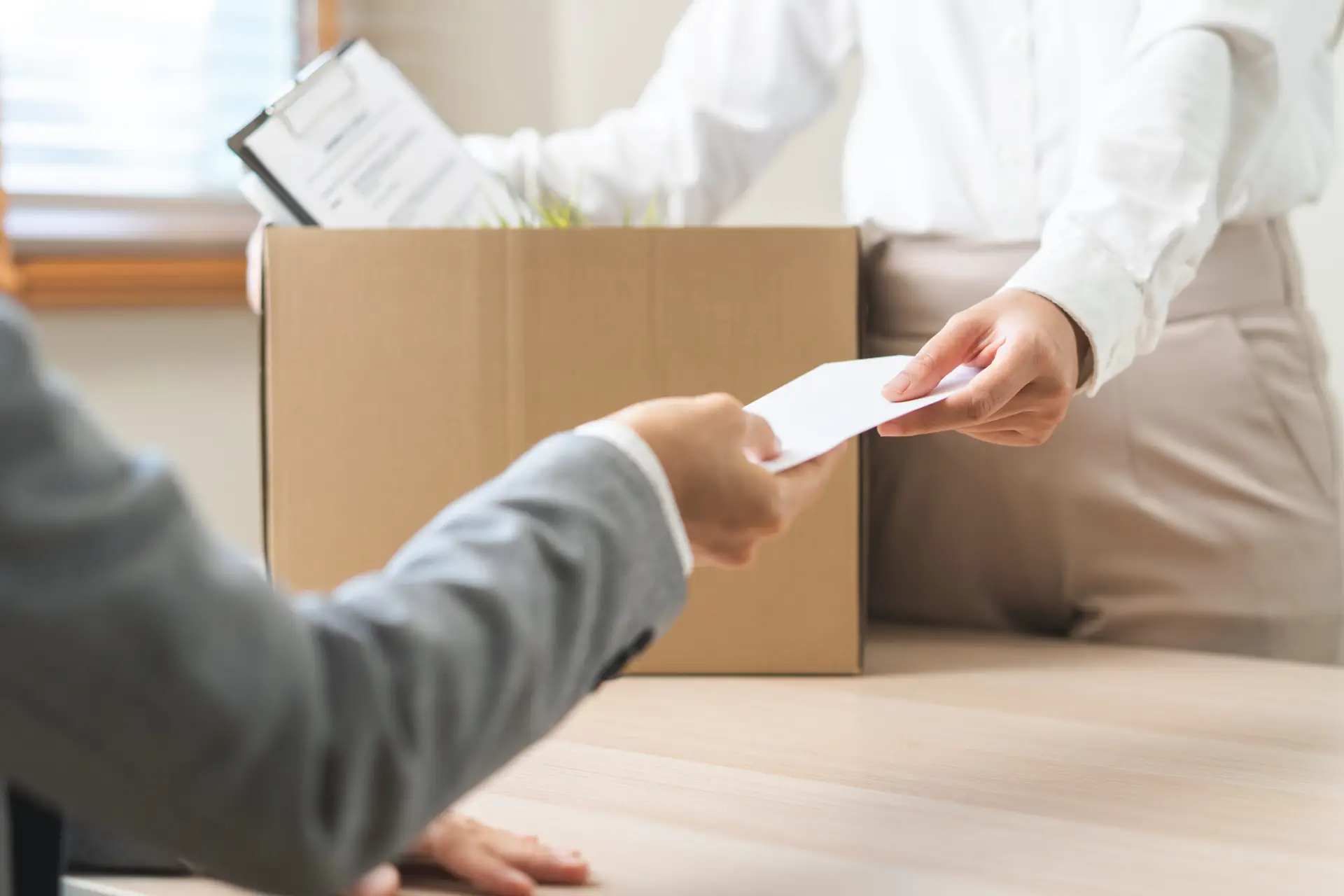 Unemployment quitting job, desperate asian young business woman send resignation letter to boss, resigning from company,holding belongs, pack stuff in box, layoff or leaving, changing work employment