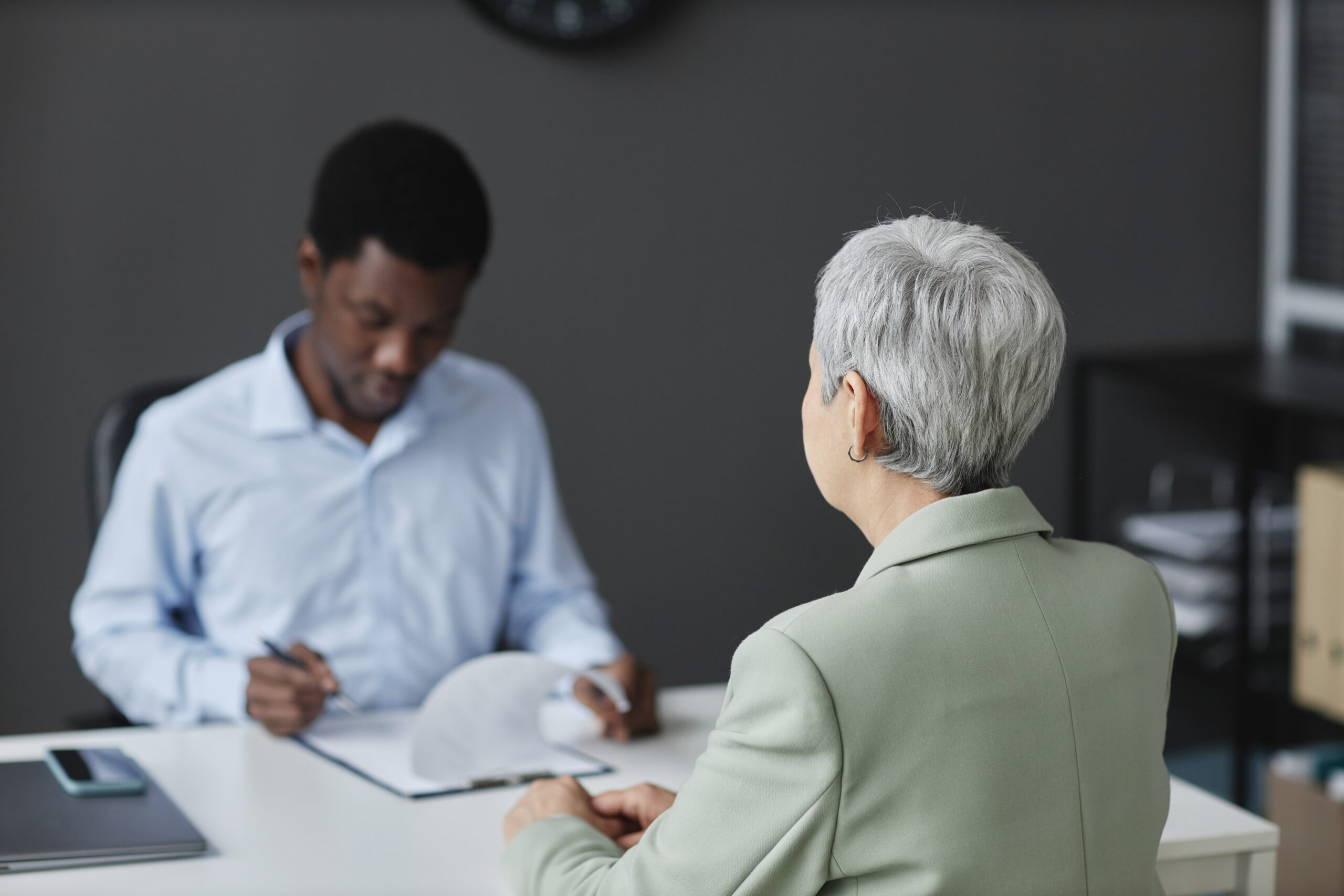 Senior candidate in job interview with HR recruiter