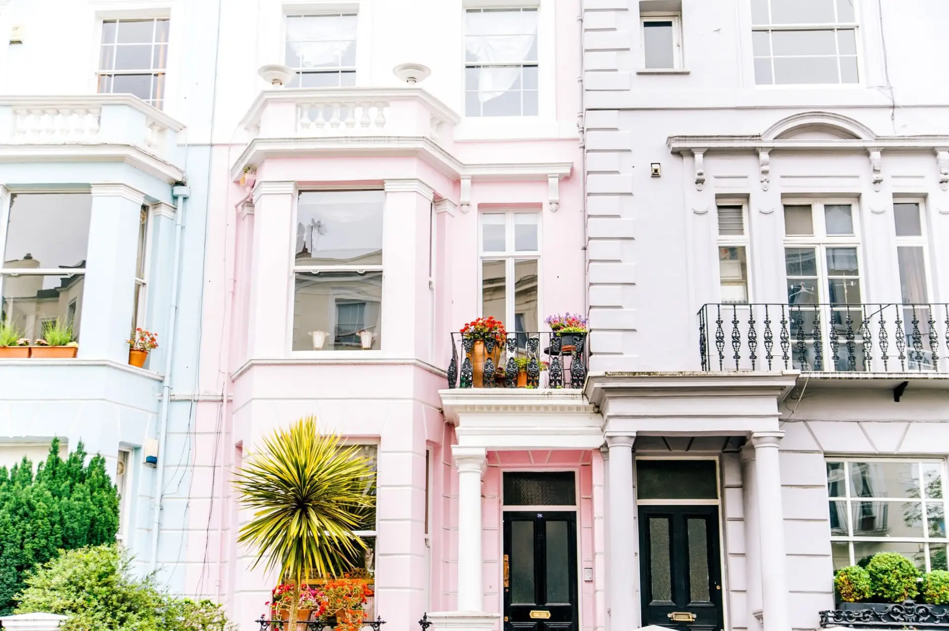 architectural-photography-of-white-and-pink-high-rise-709831-scaled-1