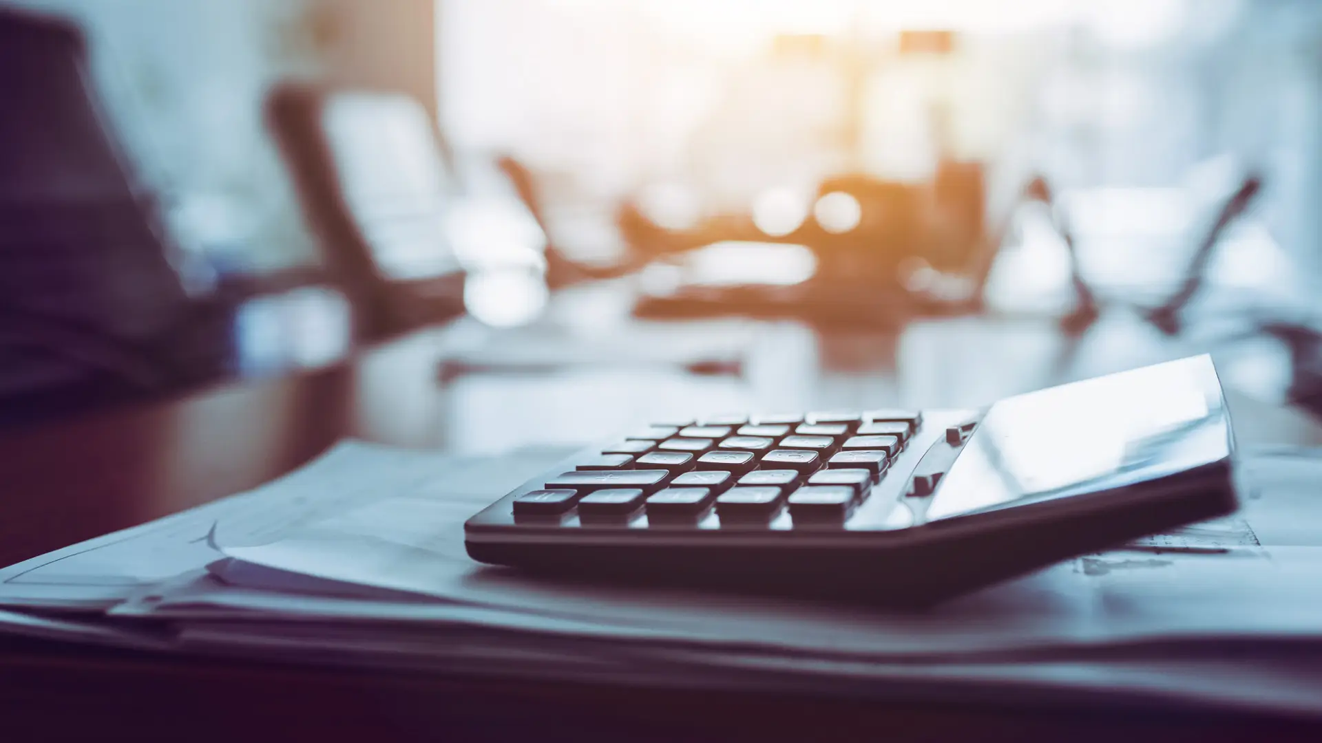 close-up-calculator-business-working-desk-dark-background