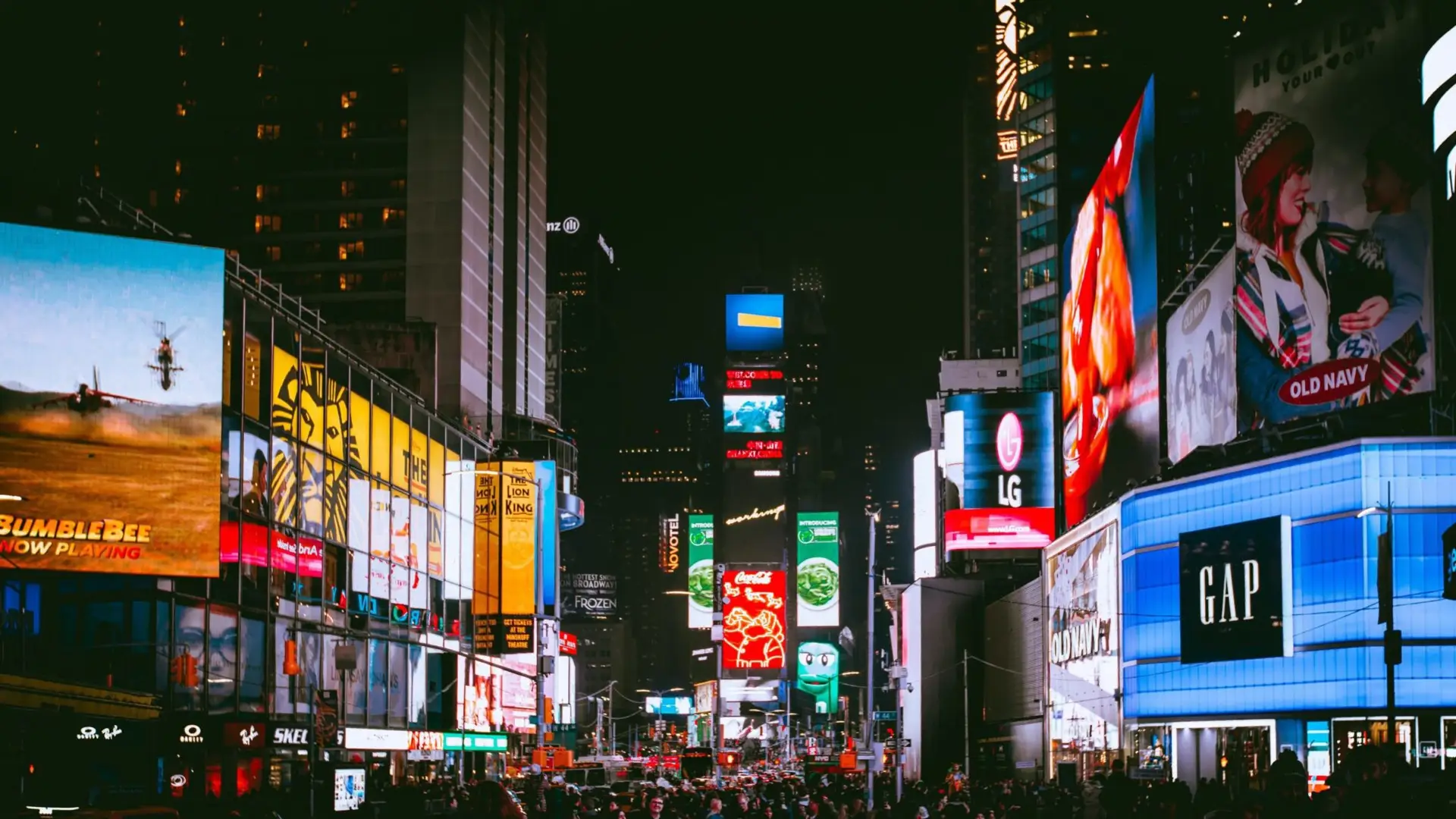 crowd-of-people-on-street-with-city-lights-1737955-scaled-1