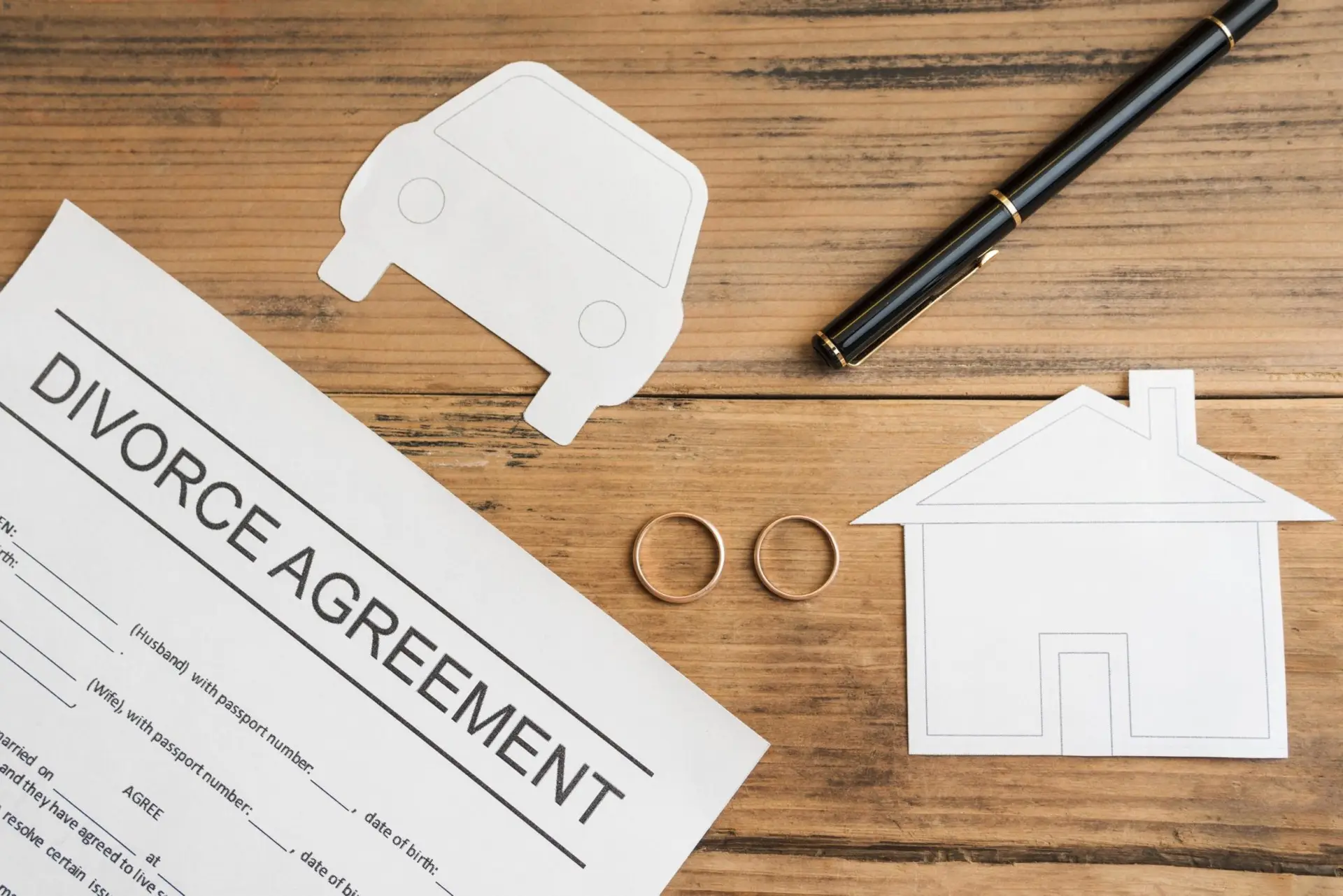 divorce-agreement-wooden-background-scaled-1