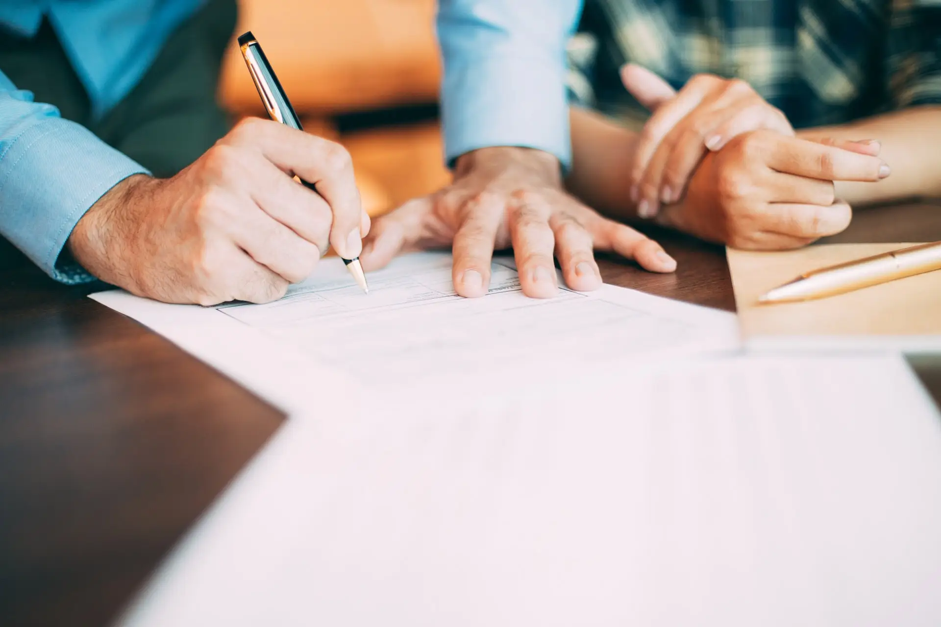 employer-signing-woman-employment-contract