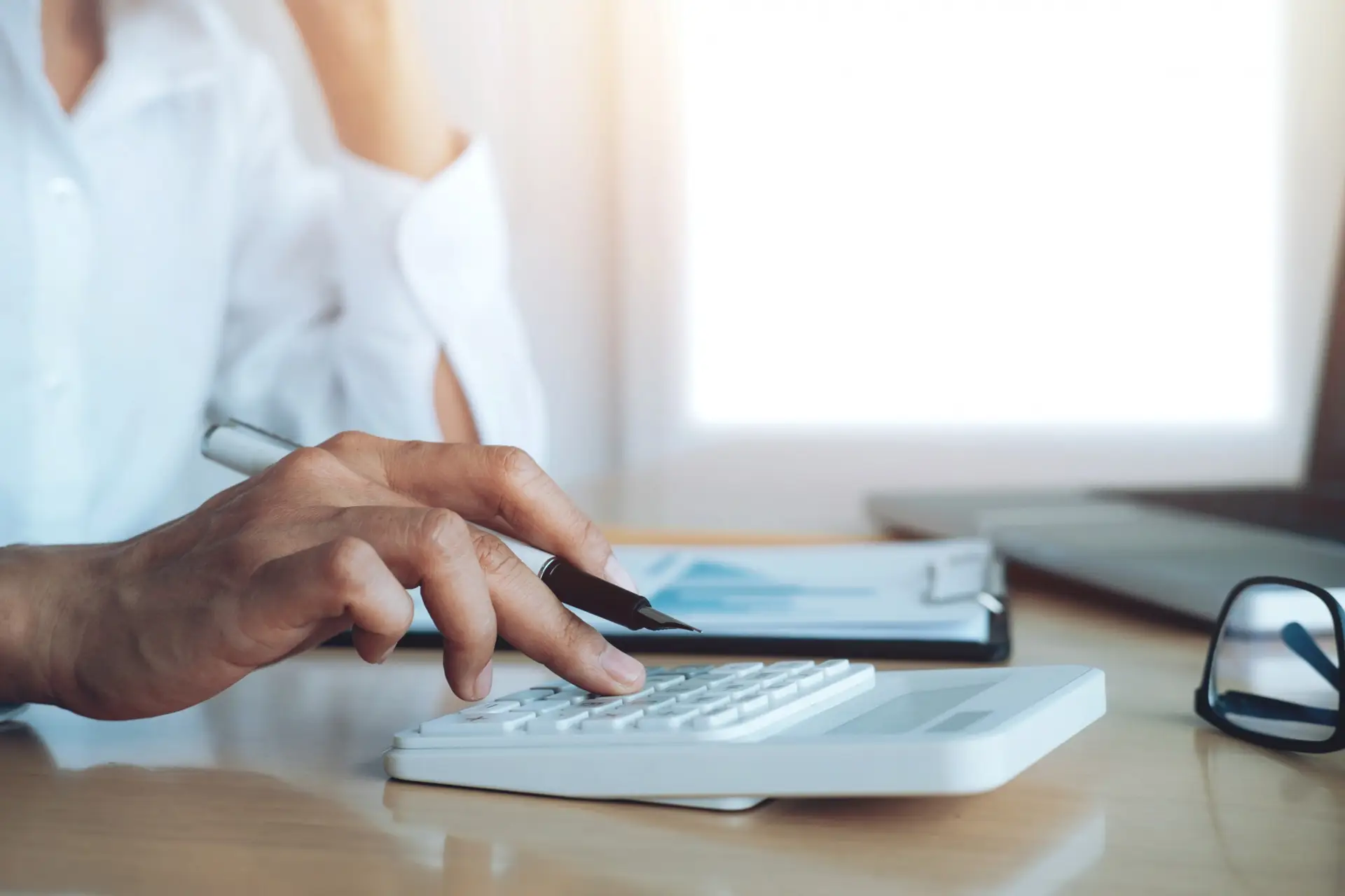 finances-saveing-economy-concept-female-accountant-banker-use-calculator