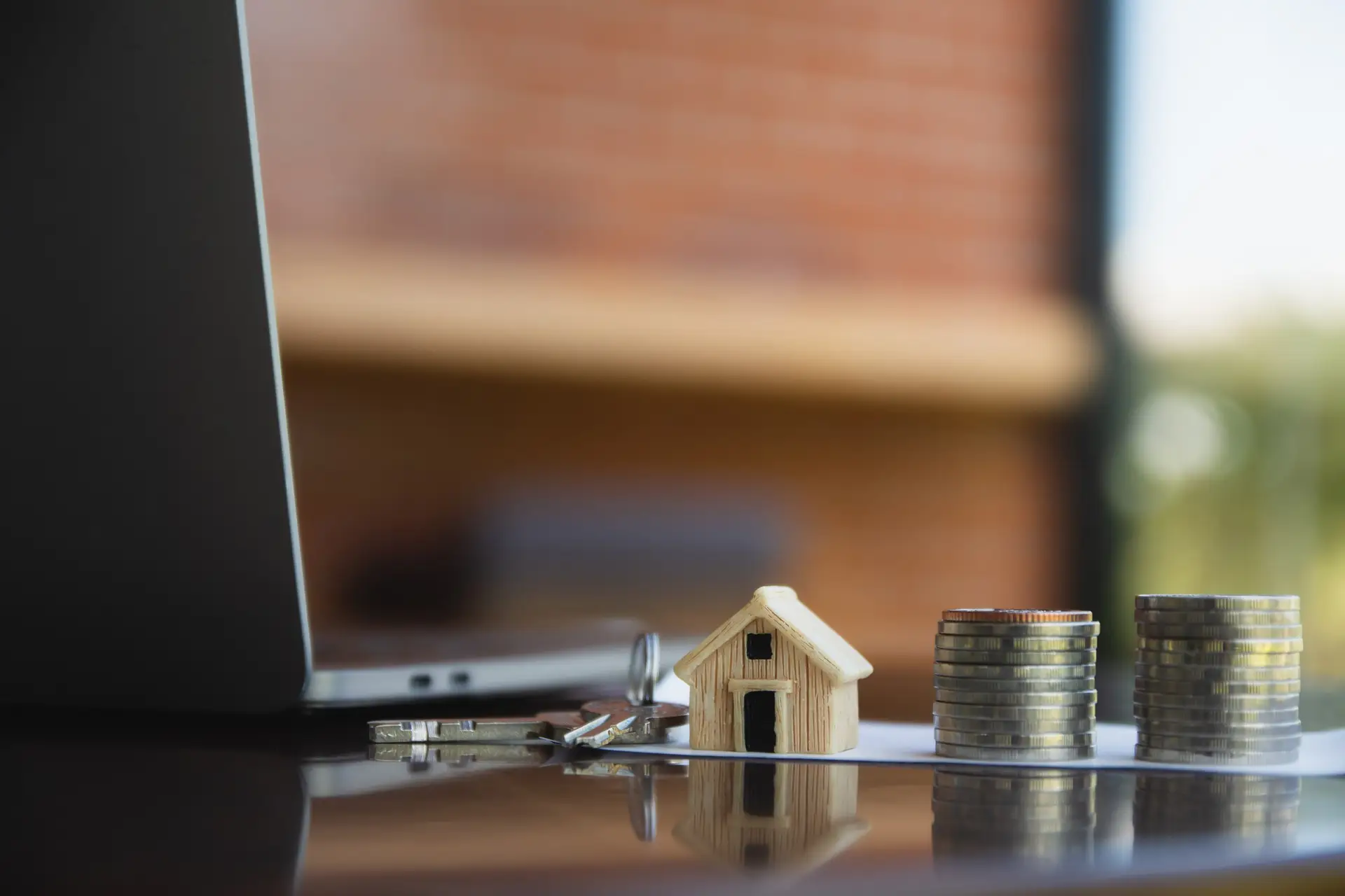 home-loan-coins-stack-table-computer-side-view-background-concept-money-business-investment