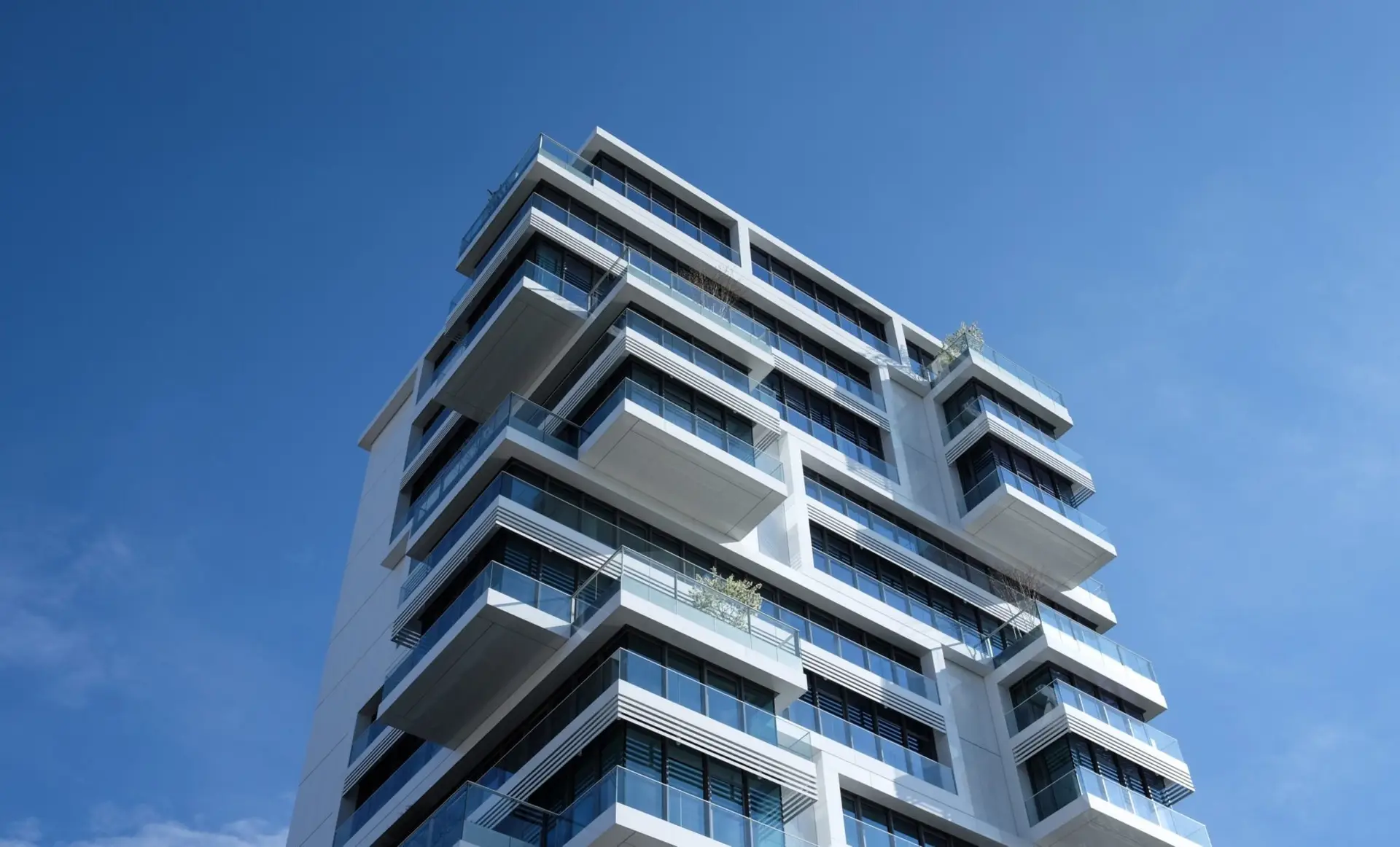 houses-building-blue-sky-appartments-87223-scaled-1