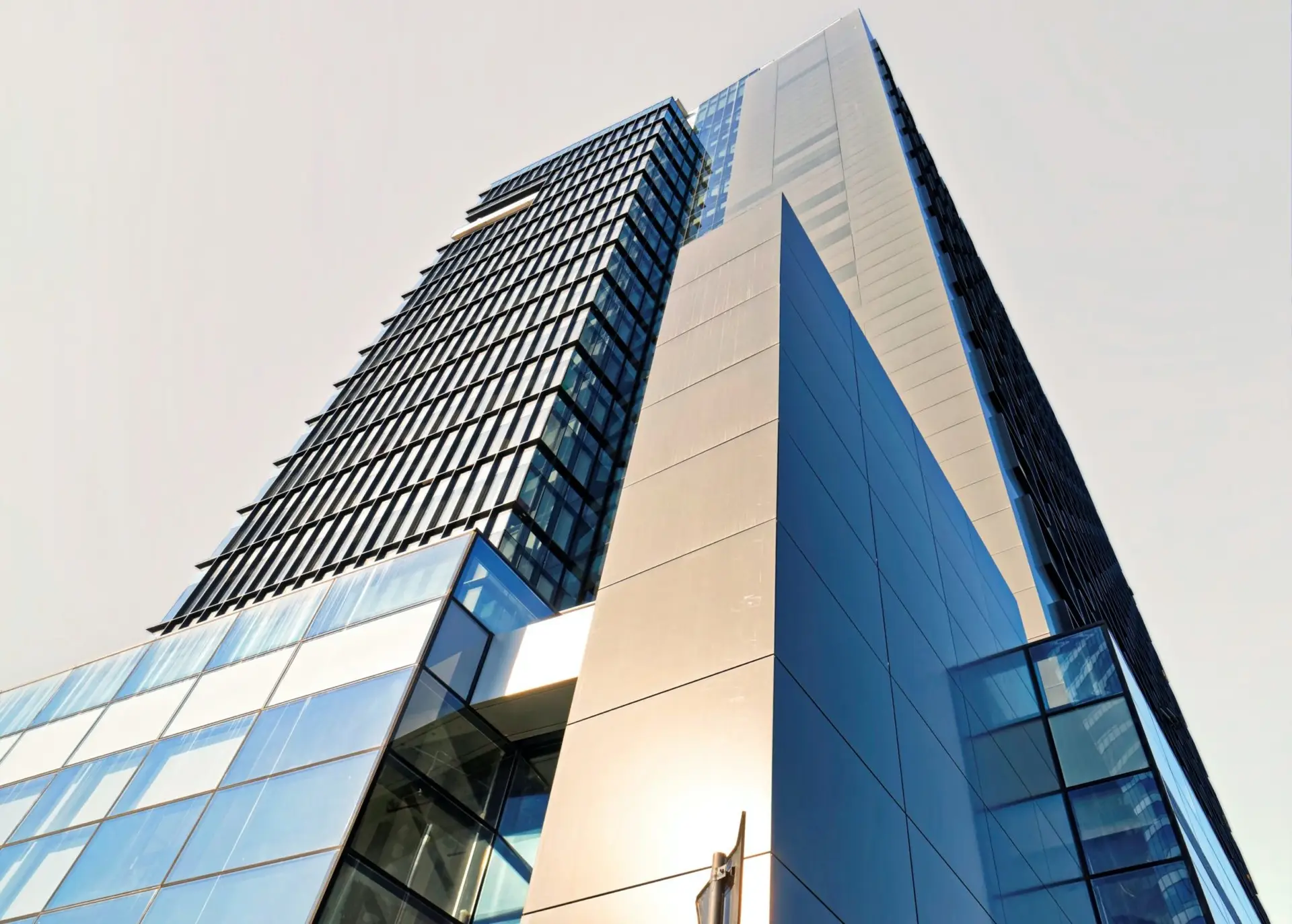 low-angle-photo-of-curtain-wall-building-1057682-scaled-1