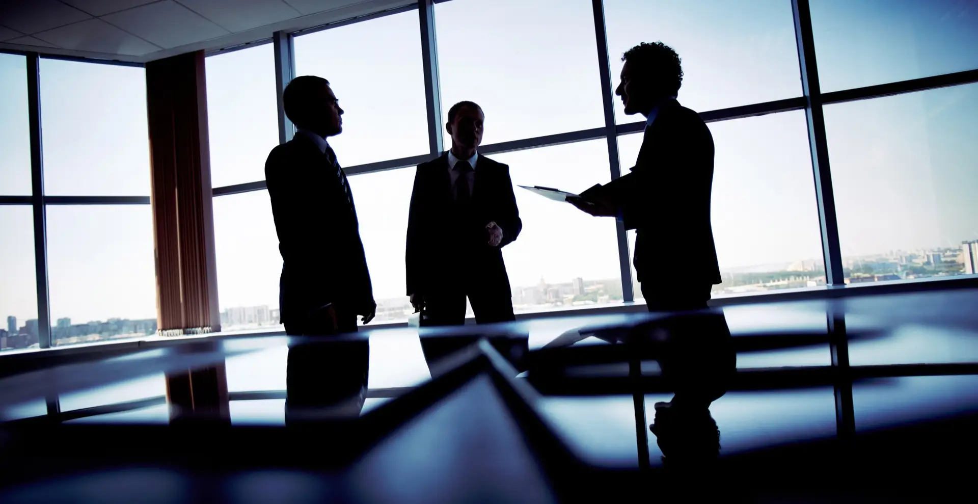 silhouettes-workers-planning-strategy